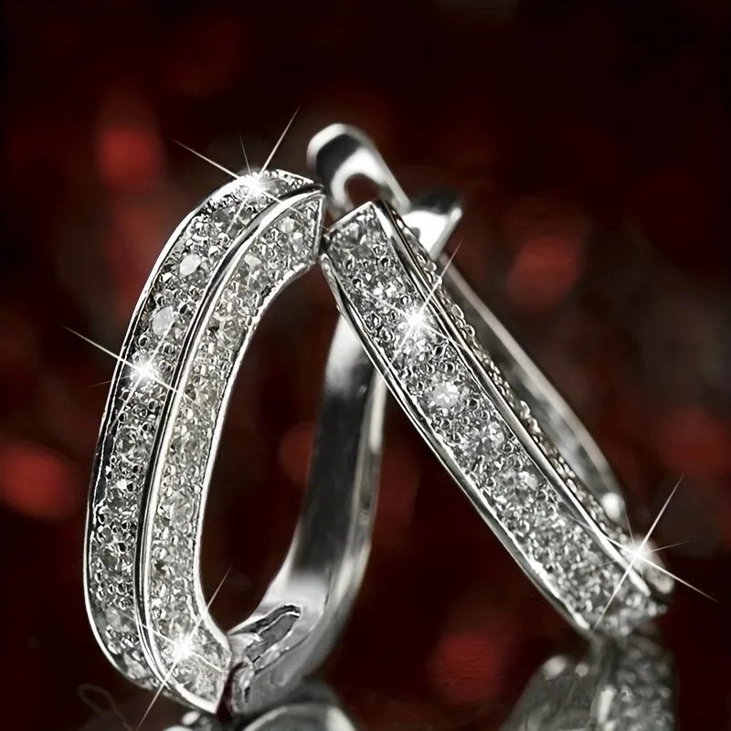 Boucles d'oreilles créoles décorées de strass brillants Ronqia Jewelry : photo 3 sur 3 du produit rappelé le 23/10/2024