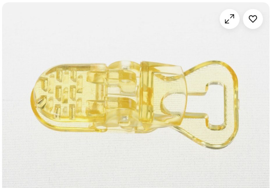 Clip attache tetine jaune en plastique Oem : photo du produit rappelé le 17/11/2025